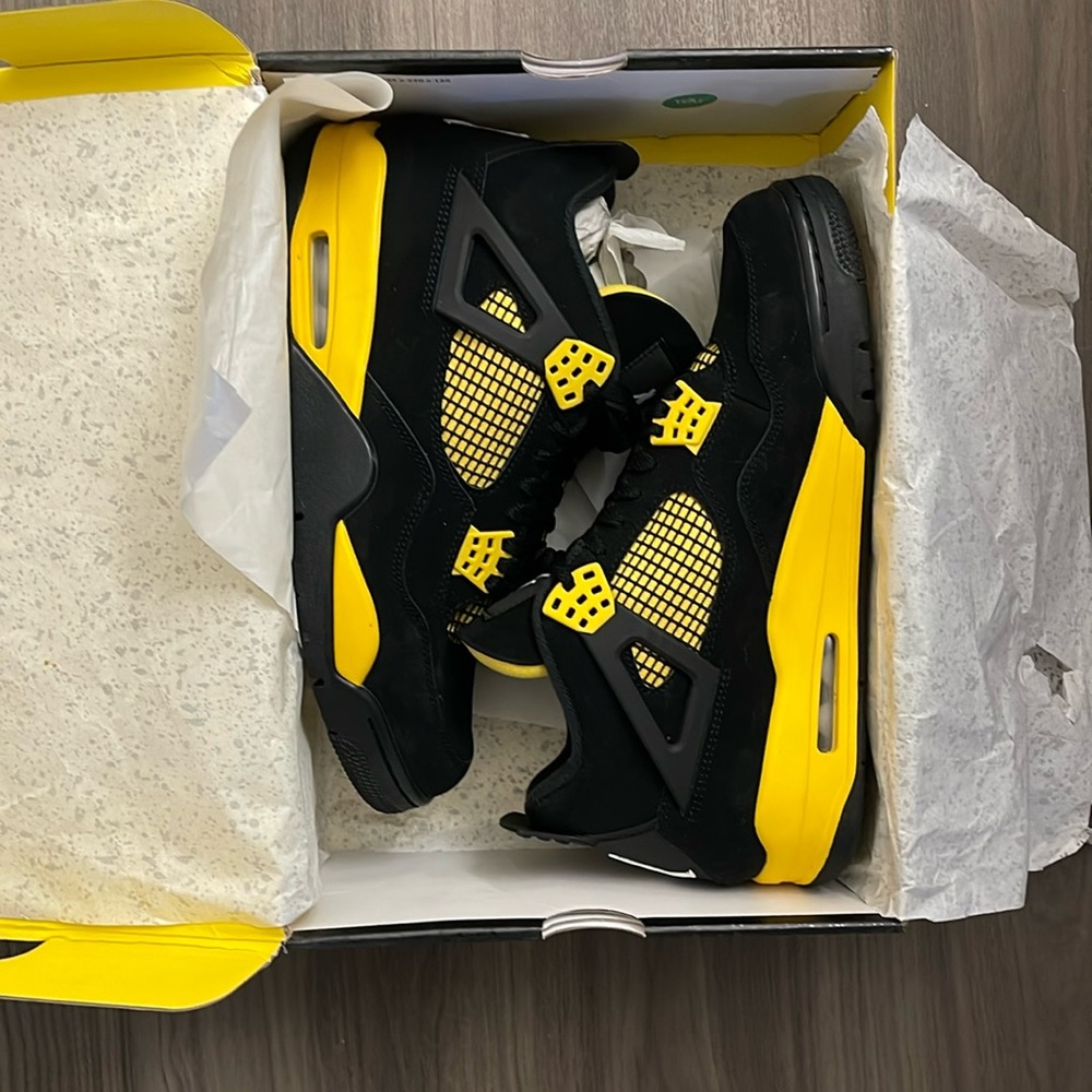 Air Jordan Retro 4 “Thunder” color way. Pristine condition!